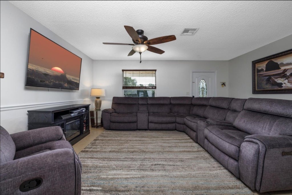 Photo of 1810 SW Gemini Lane, Port Saint Lucie, FL 34984 (MLS # B26080845)