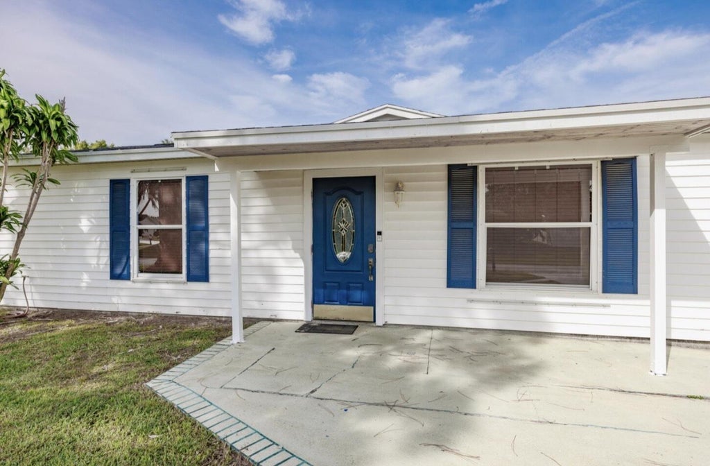 Photo of 1810 SW Gemini Lane, Port Saint Lucie, FL 34984 (MLS # B26080845)