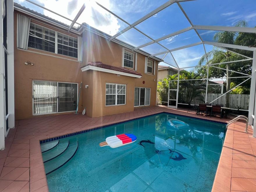 Welcome to Sawgrass Preserve! One of Sunrise's most sought-after gated communities known for its peaceful atmosphere, lush landscaping, and unbeatable location. This beautifully maintained home sits in a quiet, neighborhood surrounded by tree-lined streets, serene lakes, and well-kept homes that create a true sense of community. The home features over 2500 square feet of living space, an enclosed patio with a private pool and 4 spacious bedrooms. Inside Sawgrass Preserve, residents enjoy the comfort of a gated, tranquil setting while being just minutes from everything Sunrise has to offer.