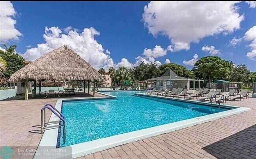 Updated top floor condo with brand newer AC, water heater, new fridge, new oven. New Vinyl wood thru out. Freshly painted walls and grass turf on patio. Lots of closet space and walk-in closet in bedroom. 55+ community. 10 minutes to the beach and close to shopping. Clubhouse and pool area next to building