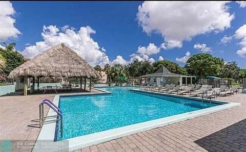 Photo of 3500 SW Natura Boulevard #306, Deerfield Beach, FL 33441 (MLS # B26006529)