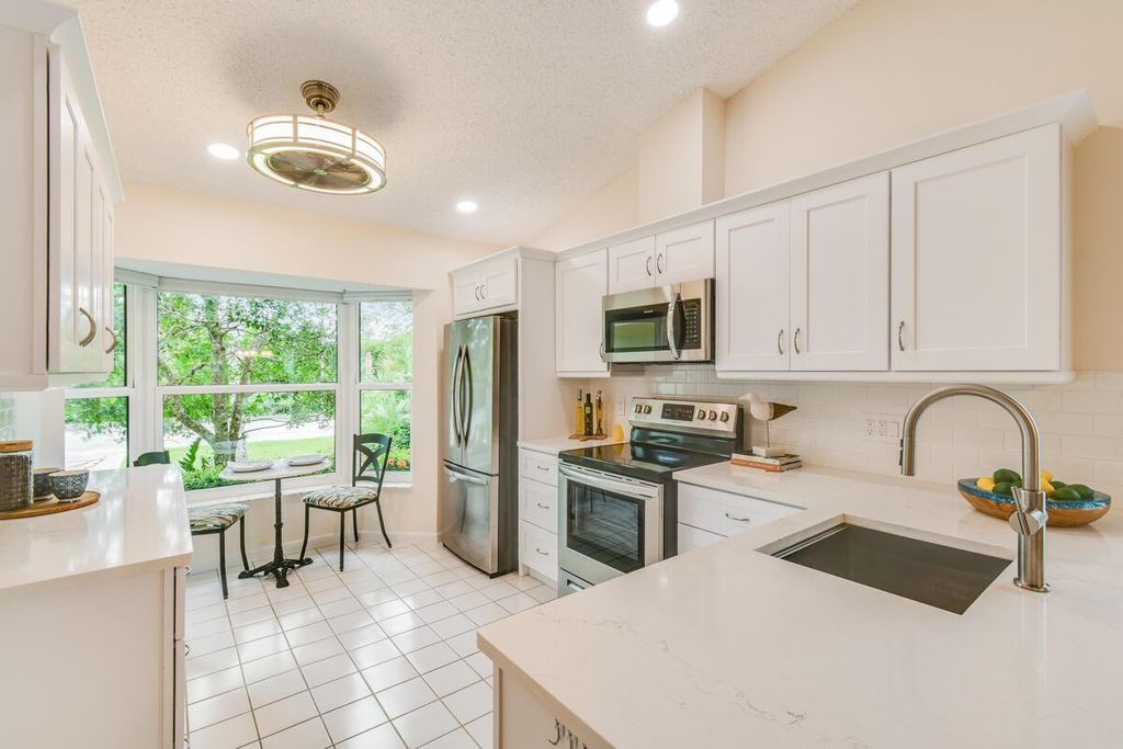 Photo of 10964 SE Sea Pines Circle, Hobe Sound, FL 33455 (MLS # R11016739)