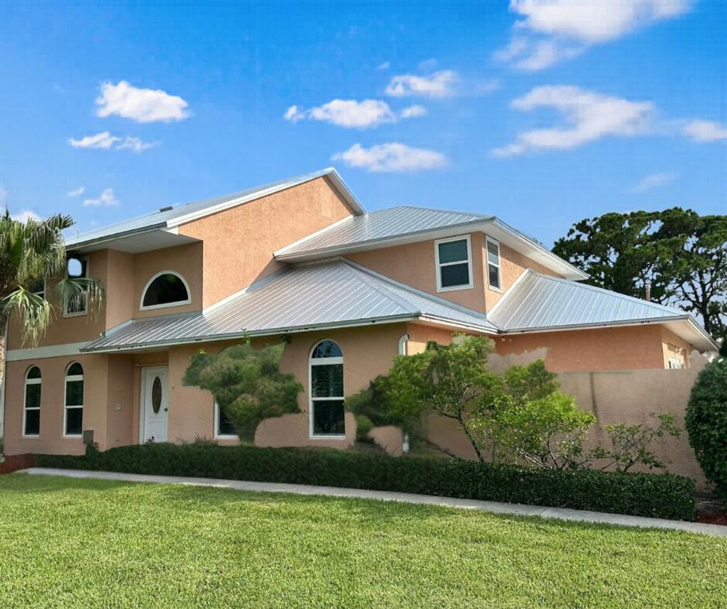 Photo of 10206 SW Yuma Terrace, Palm City, FL 34990 (MLS # B26015016)