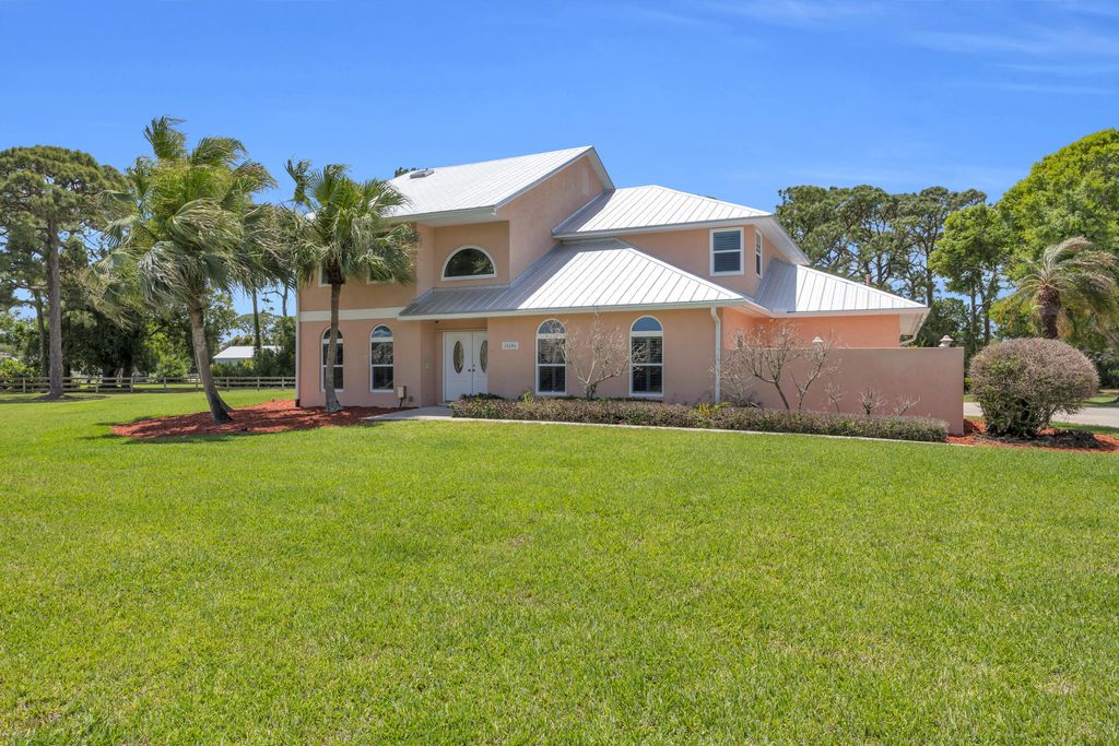 Photo of 10206 SW Yuma Terrace, Palm City, FL 34990 (MLS # B26015016)