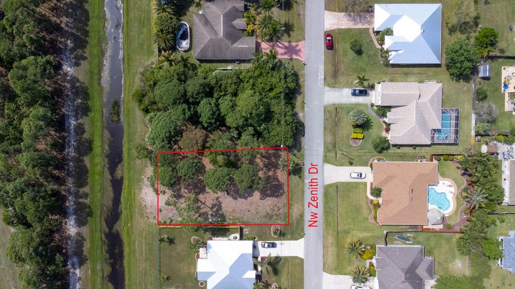 Photo of 5817 NW Zenith Drive, Port Saint Lucie, FL 34986 (MLS # R10968928)