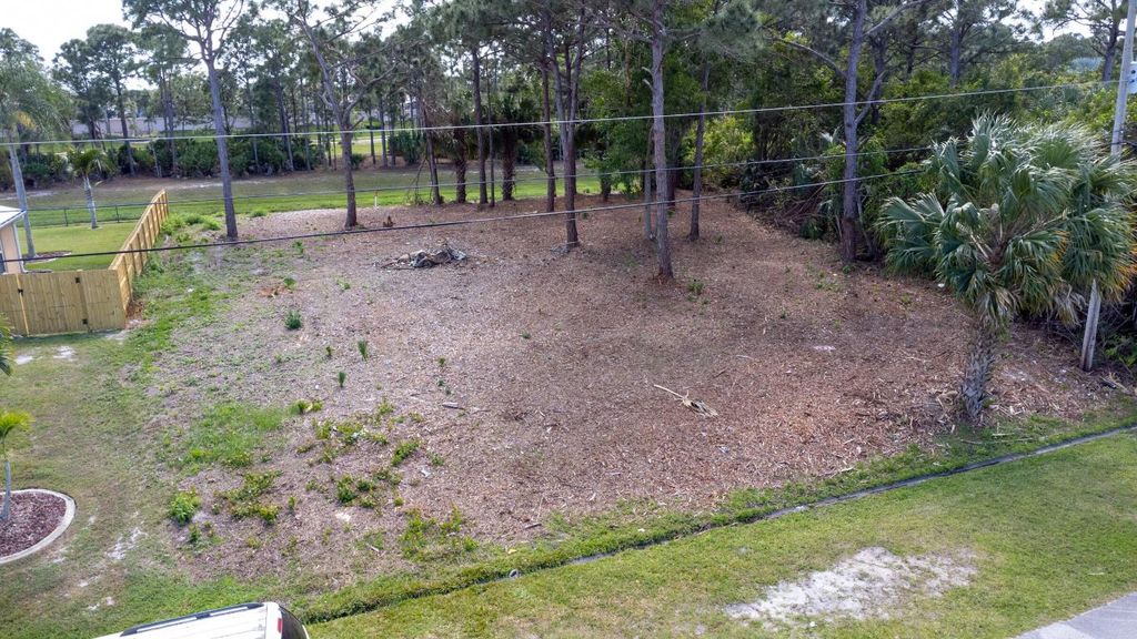 Photo of 5817 NW Zenith Drive, Port Saint Lucie, FL 34986 (MLS # R10968928)