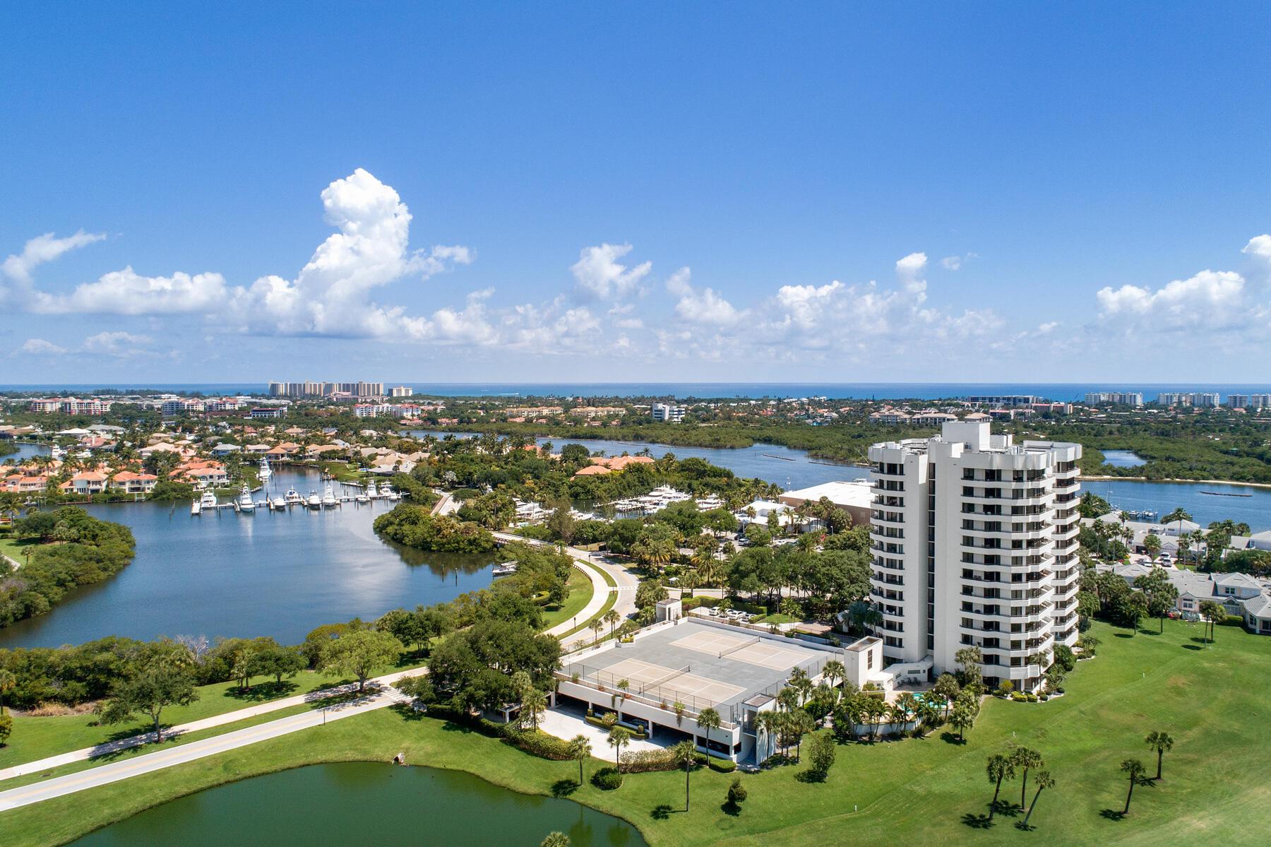 A spacious, designer-furnished condo is available for annual rental in Jonathan's Landing, in Southporte One the community's only high-rise. This stunning condo is situated along the golf course and just minutes from Jupiter's amazing restaurants, beaches, shops, and Palm Beach International Airport. Southporte One, a recently renovated building, boasts a beautiful community room and kitchen, as well as tennis courts and covered parking. Golf cart use is included with the rental. Let the photos showcase the charm and luxury of this exceptional condo!