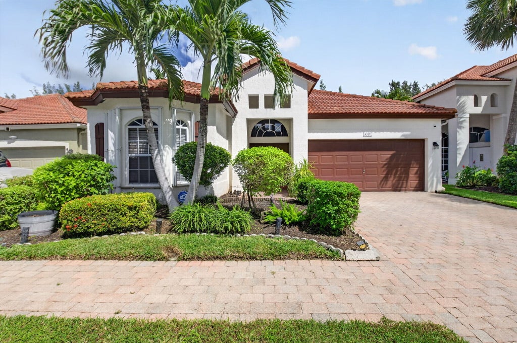 Photo of 4819 Gateway Gardens Drive, Boynton Beach, FL 33436 (MLS # B26080987)