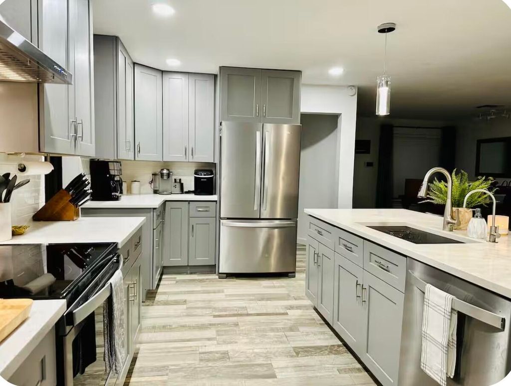 Photo of 528 Date Palm Drive, Lake Park, FL 33403 (MLS # B26047694)