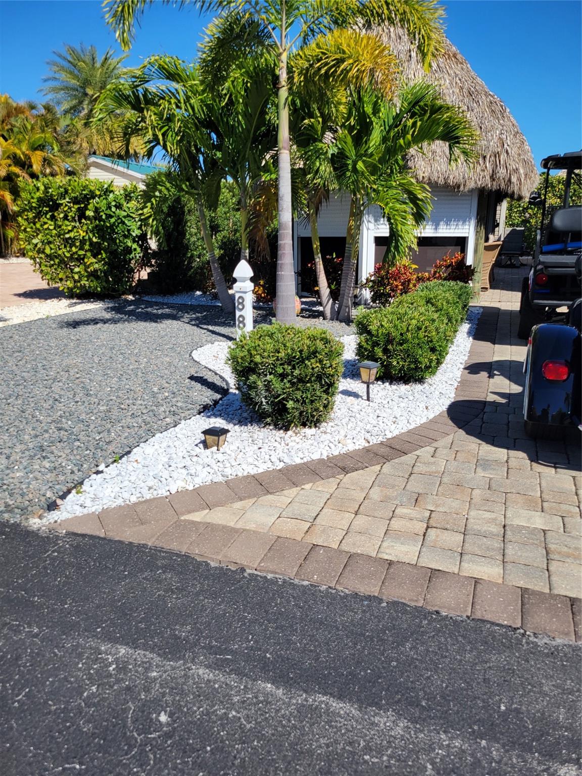 Located in Silver Palms Rv Resort. 1/4 North of Lake Okeechobee, This amazing lot feature a custom tiki with electric roll down screens and shutters and finished casita with 1/2 bath, ac, kitchen counter top, fridge and tasteful decor. FULLY DEEDED LOT OWNERSHIP ! Seasonal or full time use, own your piece of paradise and have that special place every year. Clubhouse, daily activities, billiard, card, library, fitness room, poolside cafe, dog park, pickleball and so much more awaits you at this beautiful resort. Have the comfort of knowing where your place in the sun will be every year.