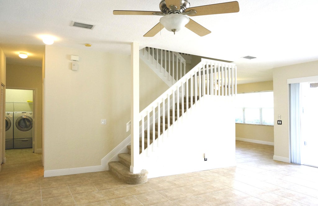 Photo of 139 Canterbury Place, Royal Palm Beach, FL 33414 (MLS # R10942514)