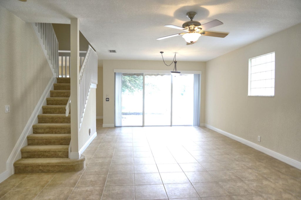 Photo of 139 Canterbury Place, Royal Palm Beach, FL 33414 (MLS # R10942514)