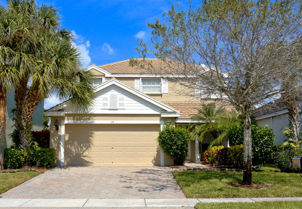 Photo of 139 Canterbury Place, Royal Palm Beach, FL 33414 (MLS # R10942514)