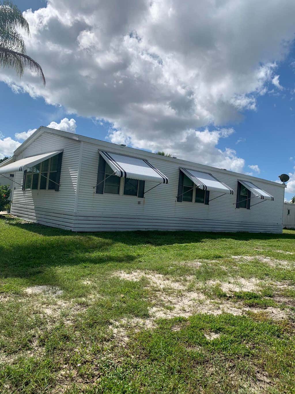 Photo of 9 Maya Way, Port Saint Lucie, FL 34952 (MLS # B26064859)