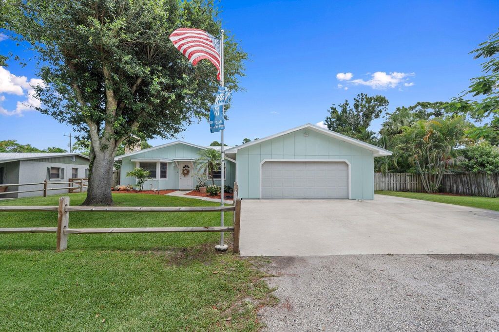 Photo of 5060 W Virginia Drive, Fort Pierce, FL 34981 (MLS # R11101893)