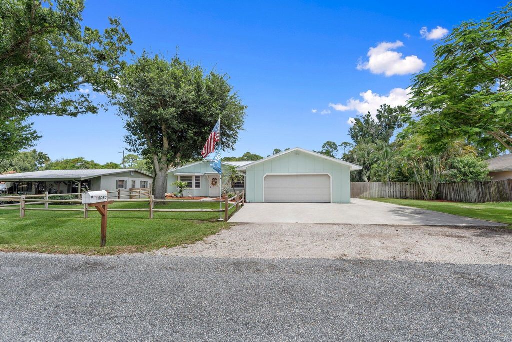 Photo of 5060 W Virginia Drive, Fort Pierce, FL 34981 (MLS # R11101893)