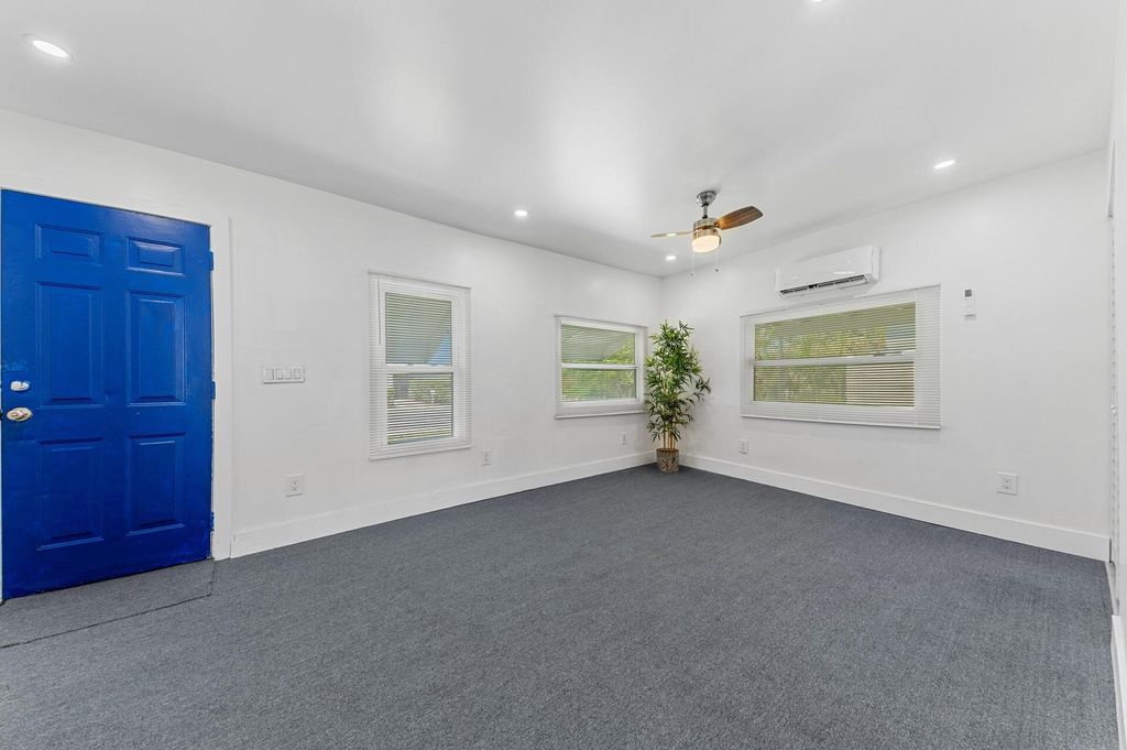 Photo of 710 N H Street, Lake Worth Beach, FL 33460 (MLS # B26008455)