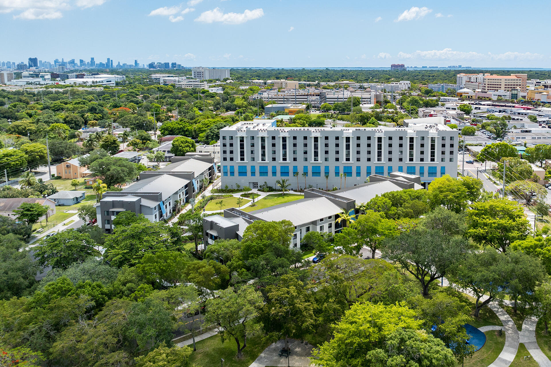 Enjoy modern conveniences while living in a park-like setting. Outdoor amenities include a dog park and covered gazebo along with nearly one-acre of central green space. Indoors you'll find a clubroom equipped with arcade games and large-screen TVs adjacent to the landscaped courtyard. Residences at SoMi Parc also offers a state-of-the-art fitness center and multiple convenient spaces for remote working and private conferences.