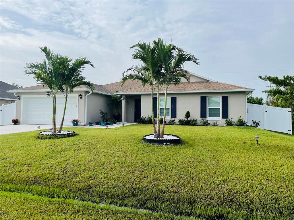 Photo of 112 SW Ridgecrest Drive, Port Saint Lucie, FL 34953 (MLS # R10815659)