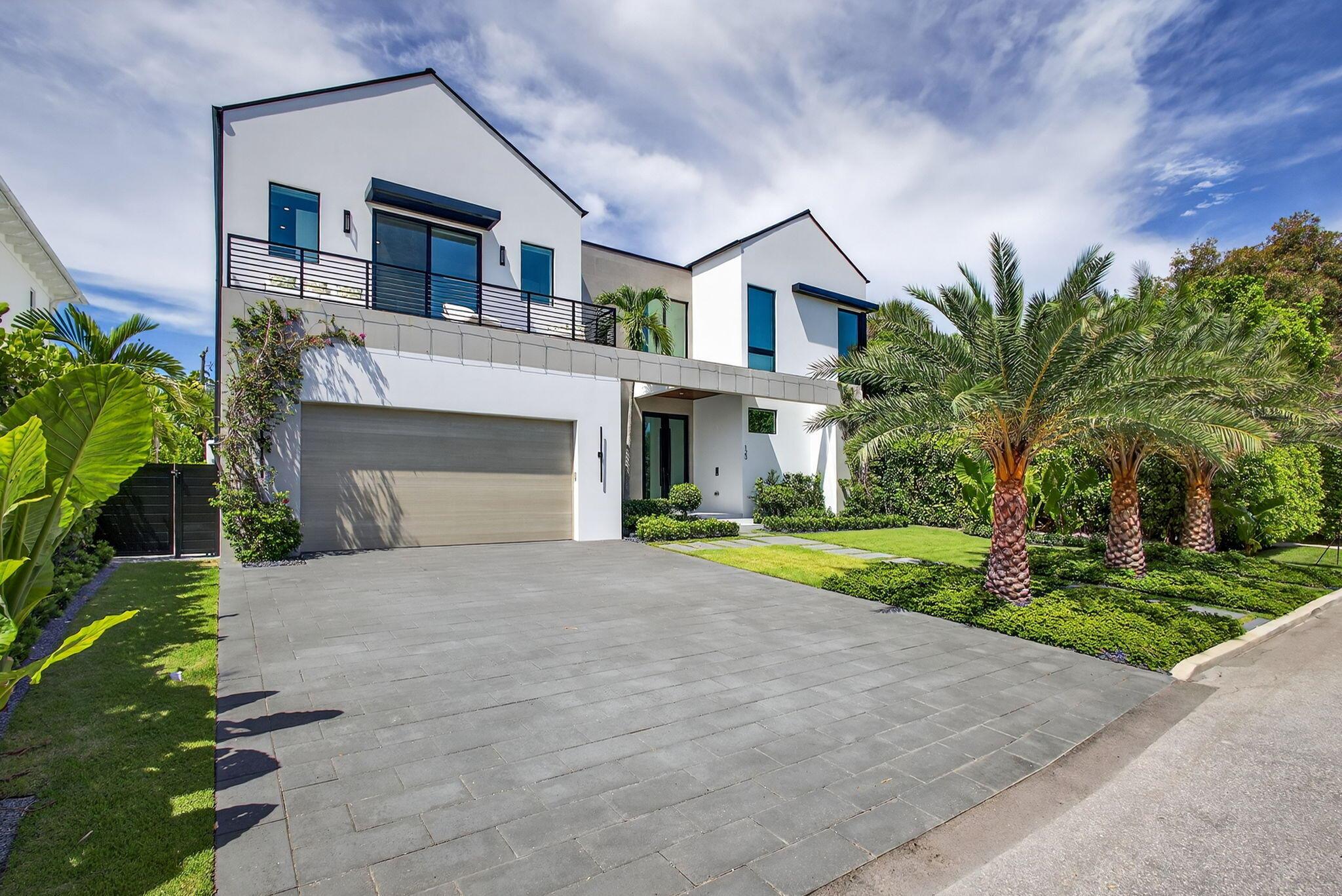 Welcome to West Palm Beach Living at its finest! This beautifully designed 5-bedroom home, plus a detached guest house that serves as a 6th bedroom, offers space, style, and unbeatable convenience. Designed with modern finishes and fully furnished for immediate move-in, the property features an open-concept layout, sleek kitchen with a gas range, oversized island with a breakfast bar, a wet bar and spacious bedrooms perfect for families or groups. Stunning views of the Intracoastal and Palm Beach Island. Step outside to your private backyard oasis, complete with a sparkling gas heated pool, built in grill, and plenty of space to relax or entertain. Enjoy a lovely al-fresco dining area. The separate guest house provides additional privacy for visitors or remote work needs.