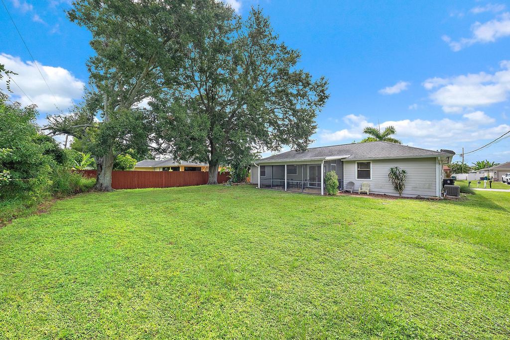 Photo of 1433 SW San Esteban Avenue, Port Saint Lucie, FL 34953 (MLS # R11123103)