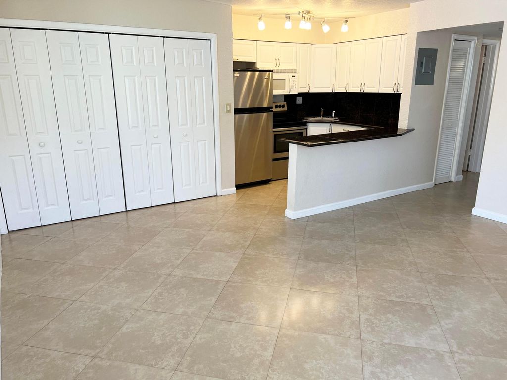 Photo of 4050 NE 12th Terrace #15-1, Oakland Park, FL 33334 (MLS # B26031175)
