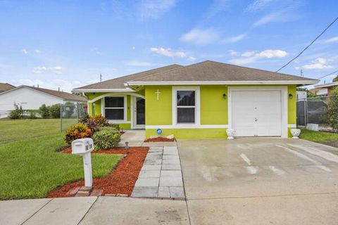 Photo of 1274 W 33rd Street, Riviera Beach, FL 33404 (MLS # R11126312)