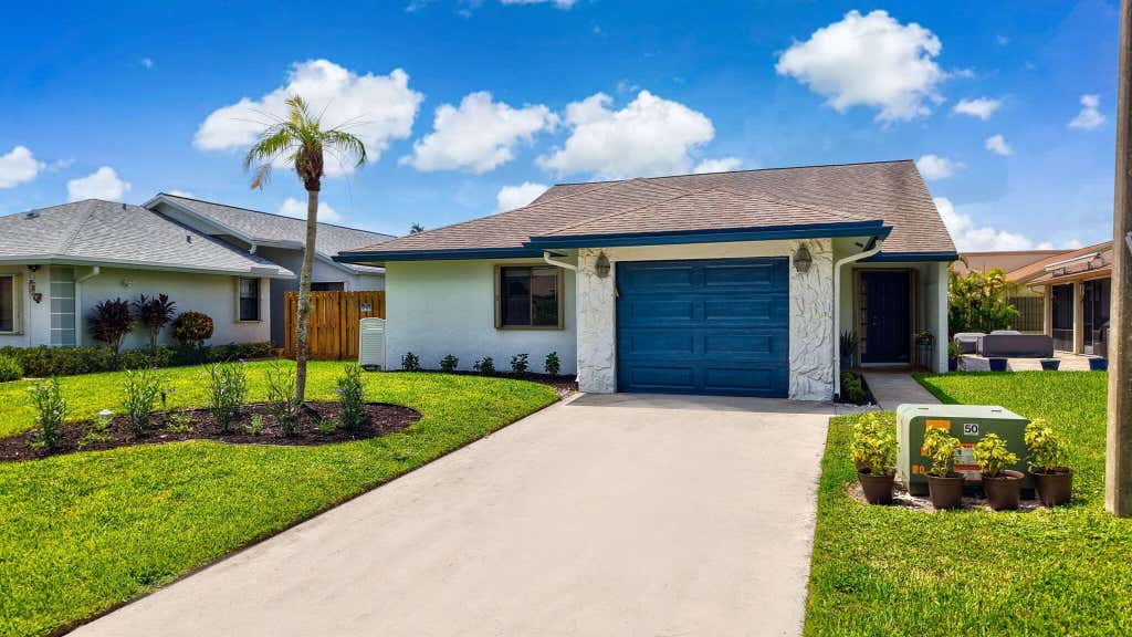 Photo of 2390 NW 15TH Street NW, Delray Beach, FL 33445 (MLS # B26066639)