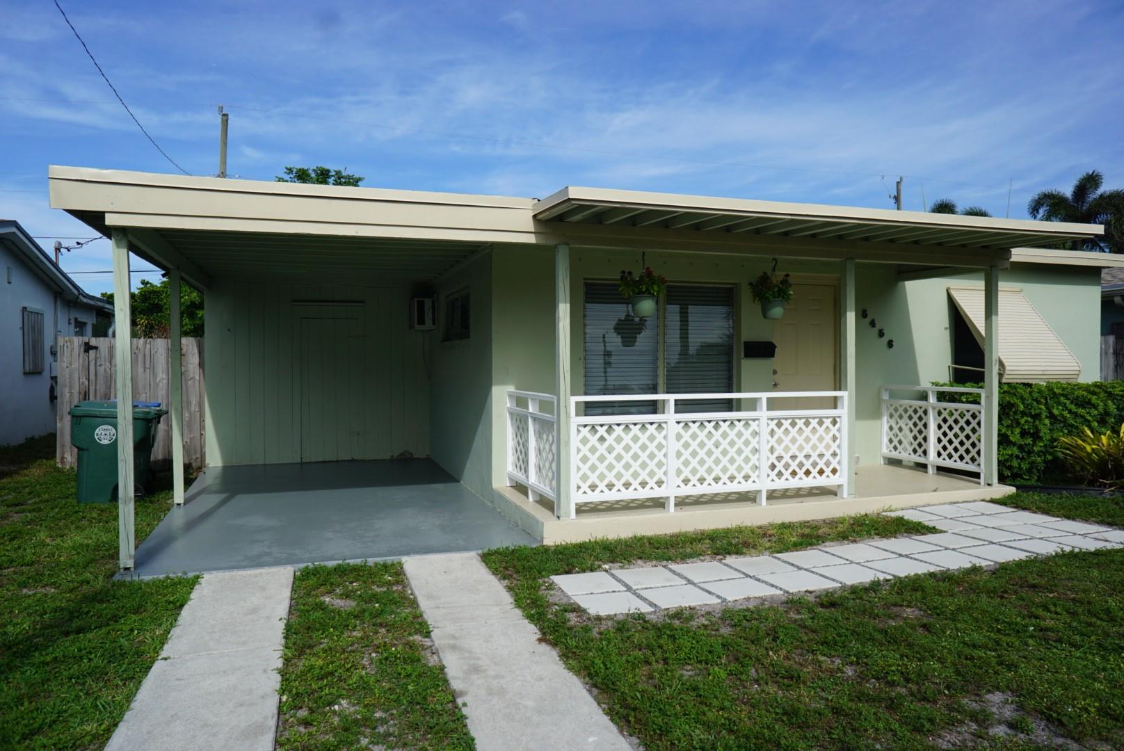 Freshly renovated 3-bedroom, 2-bathroom home in the desirable North Andrews area. Enjoy easy access to I-95 and major roads. This home features beautiful terrazzo floors throughout, with brand new carpet in the master bedroom. The updated kitchen includes a lovely eat-in area. The oversized master bedroom, located at the back of the house, boasts a large walk-in closet and a modern en suite full bathroom. A side door provides easy private access to the fully fenced backyard. Additional highlights include an interior laundry area off the master bedroom, a walk-in closet in the carport with indoor access, and a cozy covered front porch.