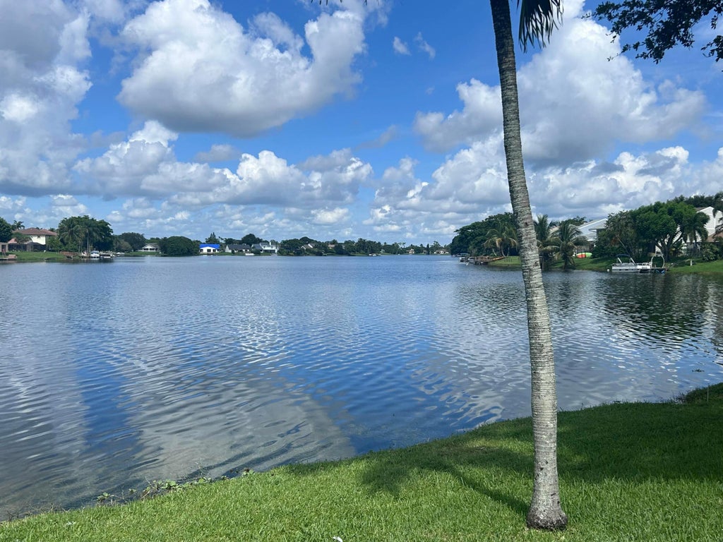 Photo of 12155 Sunset Point Circle, Wellington, FL 33414 (MLS # B26072433)