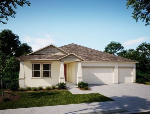 Photo of 1919 SW Mackenzie St, Port Saint Lucie, FL 34953 (MLS # F10491857)