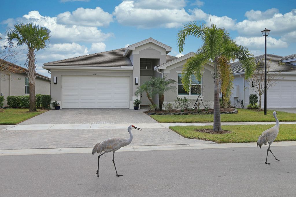 Photo of 12090 SW Jasper Lake Way, Port St Lucie, FL 34987 (MLS # R10859100)
