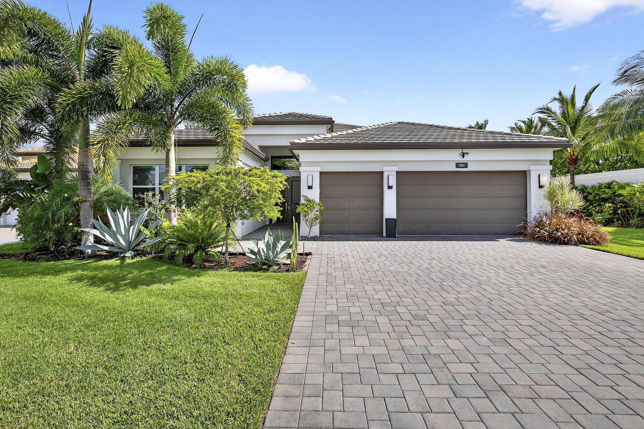 Welcome to your dream home in Valencia Sound, Boynton Beach's premier energetic and vibrant 55+ community! This stunning 4-bedroom, 3.5-bath residence offers the perfect blend of luxury, comfort, and smart design. Nestled on a premium lot with an elongated driveway and a massive, buildable backyard, this home is ideal for entertaining or creating the private oasis you've always imagined.Inside, you'll find high ceilings, top-tier designer upgrades, and the convenience of a smart home system for modern living. The open-concept layout flows beautifully from the gourmet kitchen to the spacious living and dining areas. Every detail has been thoughtfully curated for elegance and functionality.What truly sets this home apart is the oversized backyard--one of the largest in the
