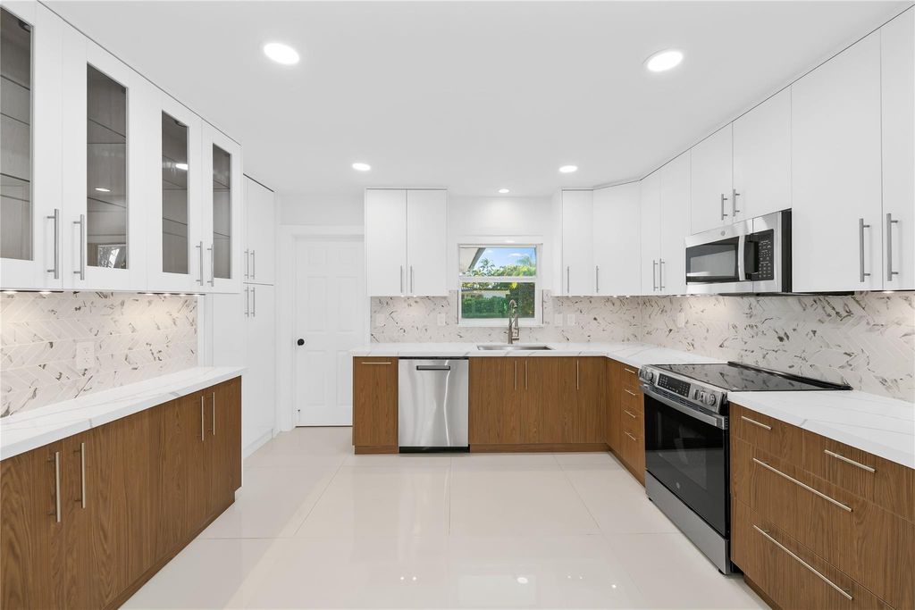 Photo of 2149 NE 58th Ct, Fort Lauderdale, FL 33308 (MLS # F10543051)