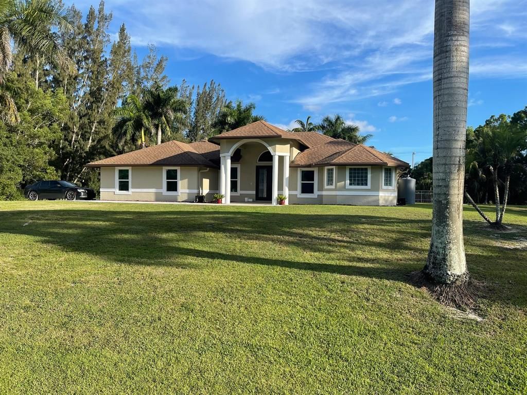 Photo of 18724 40th Run North, Loxahatchee, FL 33470 (MLS # R10821022)