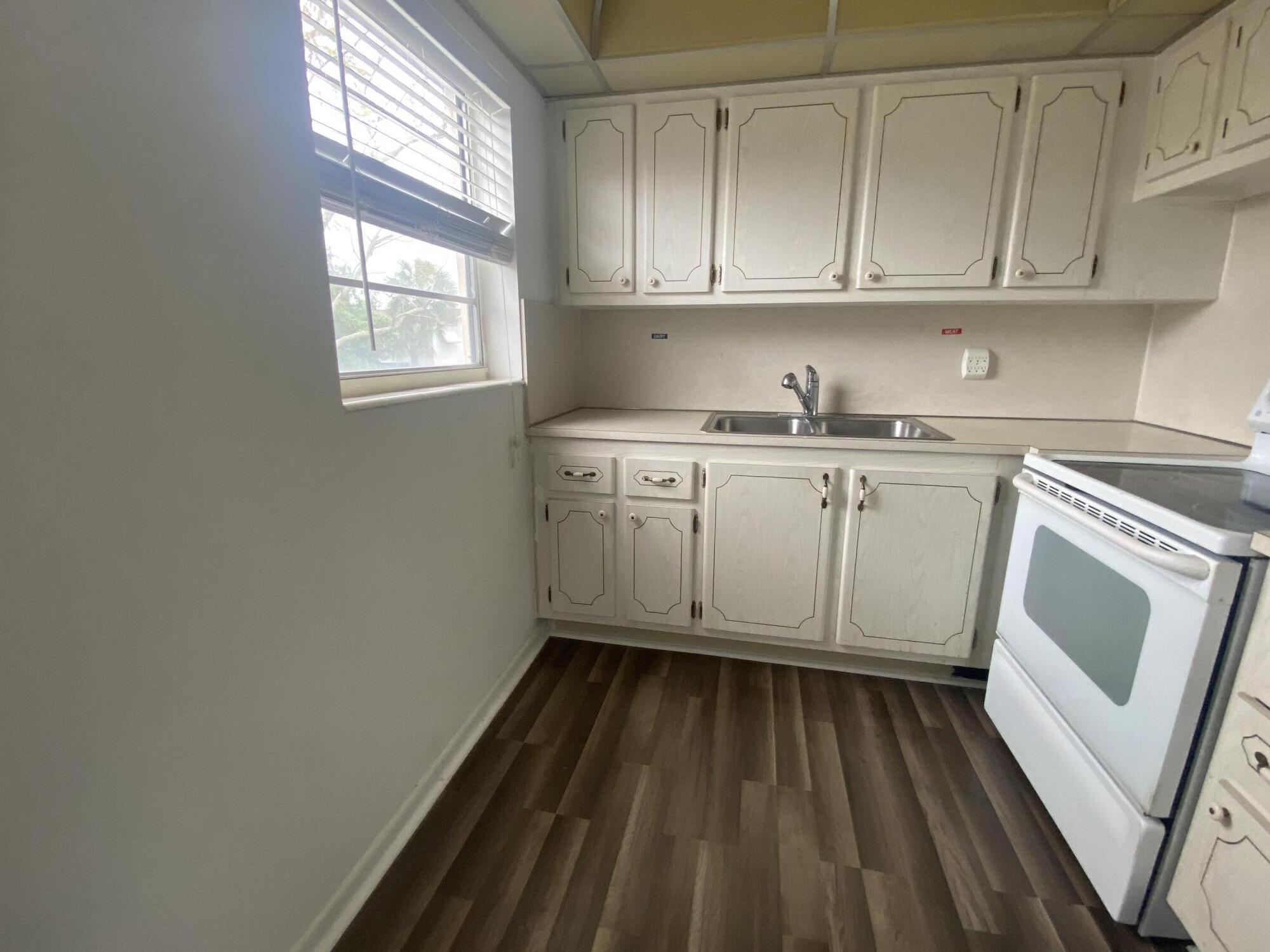 Tenant must be 55 years old or older to rent this lovely 2 BD, 1.5 Baths condo situated on the second floor, corner with Central Air. The unit is freshly pained and has updated newly installed floors. Enjoy many amenities of resort style living, like 1000 seat clubroom to watch shows and movies, indoor and outdoor pools, courtesy bus service, medical facilities, beauty shop, tennis, boating and more. Close proximity to PBI airport, restaurants, shops and beaches