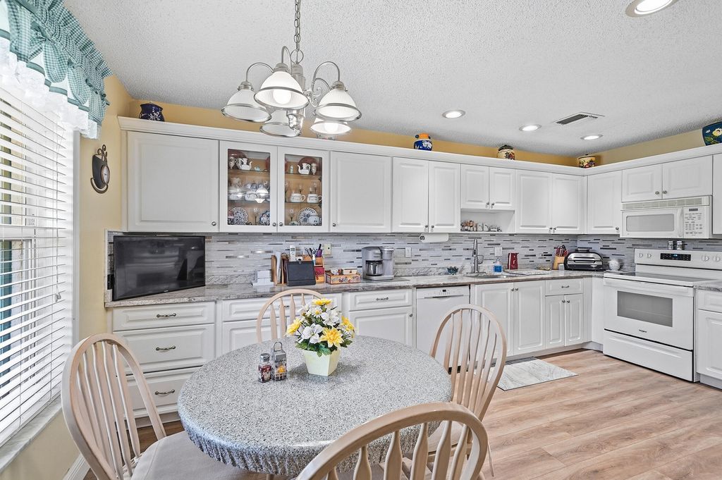 Photo of 1840 NW 13th Street #102, Delray Beach, FL 33445 (MLS # B26026442)