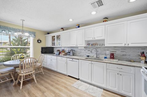 Photo of 1840 NW 13th Street #102, Delray Beach, FL 33445 (MLS # B26026442)