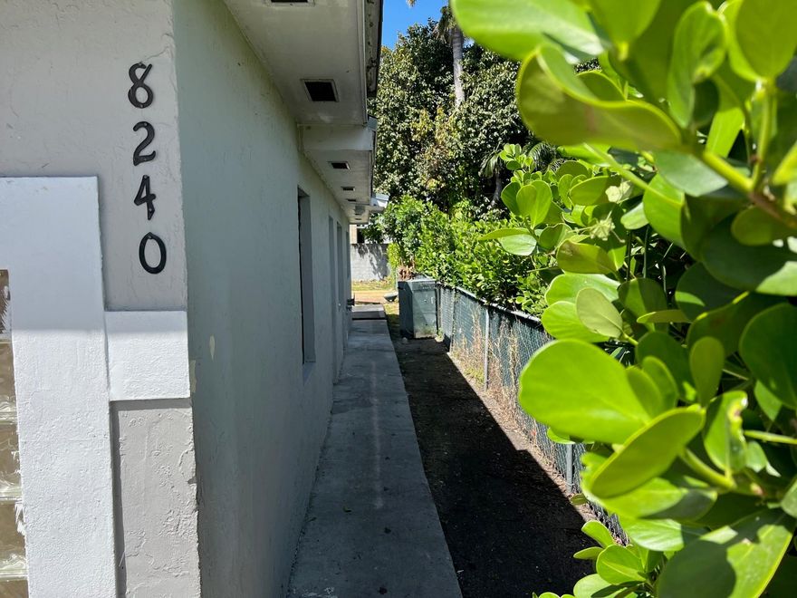 Fully renovated efficiency unit featuring tile floors, a brand-new bathroom, and impact windows for added safety and energy efficiency. This clean, modern space is perfect for comfortable living with easy maintenance. Enjoy a bright interior, fresh finishes, and a quiet setting. (Refrigerator and stove included)