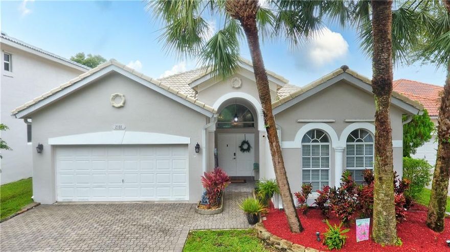 Welcome home to TROPICAL PARADISE!  Rarely available, UPDATED, 3/2 POOL home on the WATER in BUTTONWOOD HAMMOCKS. Your double door entry invites you into an amazing OPEN CONCEPT living space with soaring, knockdown ceilings & neutral ceramic tile on the diagonal.  Entertaining is a breeze in your wide-open kitchen featuring 40" cabinets w/ crown & base, S/S appliances, GRANITE counters & full tumbled marble backsplash. Large dining area and HUGE family room is ready for guests to sprawl out. IMPACT PALLADIAN WINDOW AND SLIDERS TO COVERED PATIO. Fall in love with the OVERSIZED owner's suite w/ vaulted ceilings adorned w/ crown molding. Organized Closets outfitted both closets!  Split BR. Spacious guest rooms, new guest bath.  Take a dip in your RESURFACED, SPARKLING POOL, 60' of WF! LOW HOA