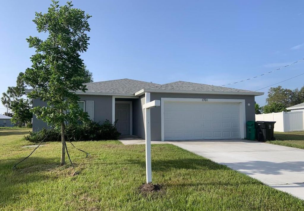 Photo of 1701 SE Flintlock Road, Port St Lucie, FL 34952 (MLS # R10903391)