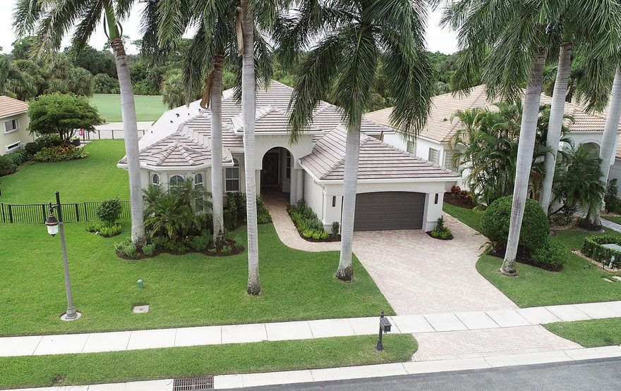 This exquisite 3-bedroom, 3.5-bathroom home with additional office space, possible 4th bedroom, boasts a pristine heated pool/spa & a large covered lanai with breathtaking views of the 5th fairway. This property offers a NEW ROOF and an exceptional living experience with a multitude of amenities & a upscale living clubhouse. This property truly blends indoor & outdoor spaces,& provides the perfect setting for a life of comfort .The foyer exudes a sense of grandeur and prestige,& the expansive living spaces are light & bright with the finest finishes and fixtures, including marble & wood flooring, & soaring ceilings creating an ambiance of timeless beauty and grace. The kitchen featuring custom cabinetry & a spacious island perfect for entertaining guests.