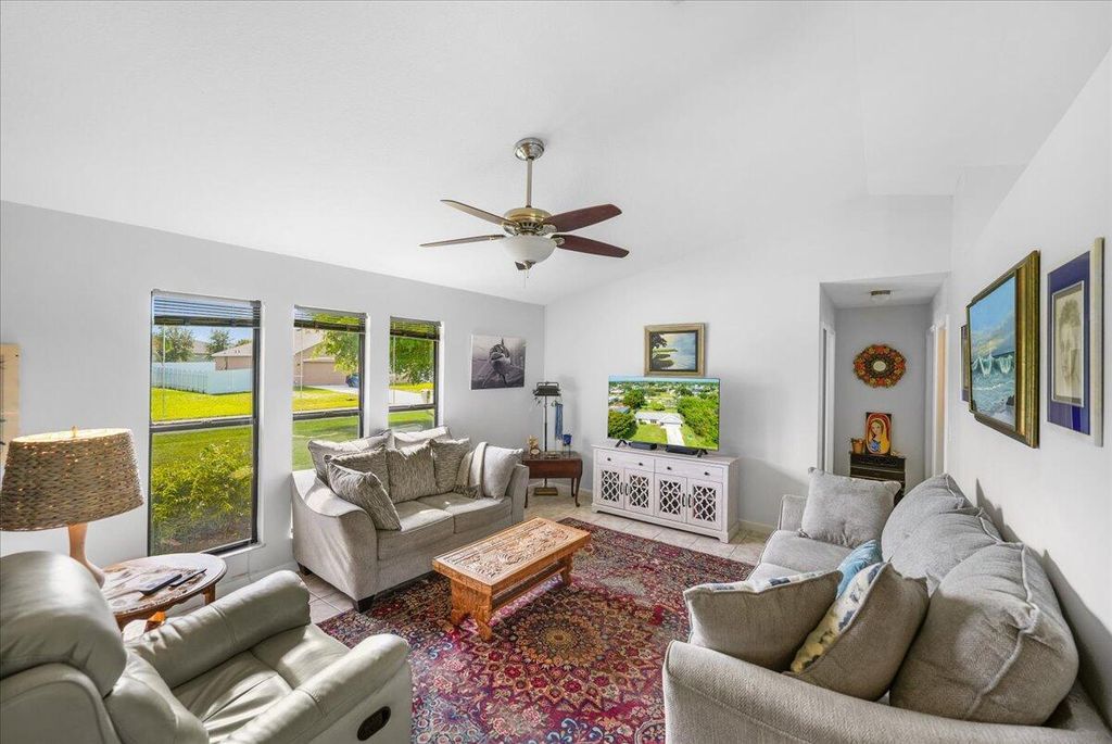 Photo of 981 SE Candle Avenue, Port Saint Lucie, FL 34983 (MLS # R11140816)