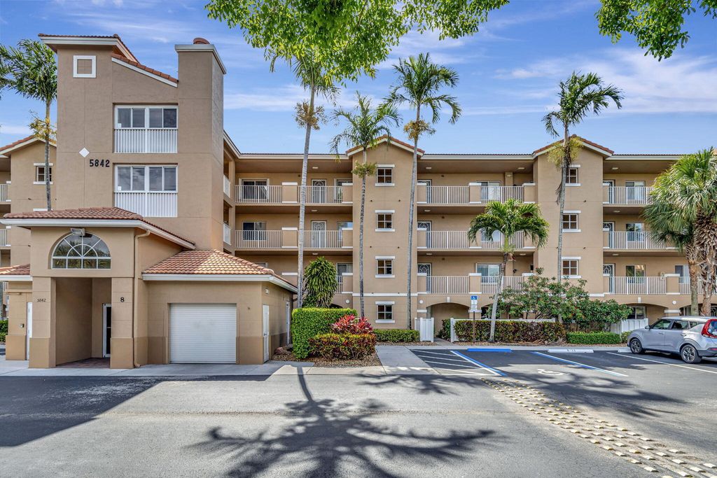 Photo of 5842 Crystal Shores Drive #105, Boynton Beach, FL 33437 (MLS # B26024909)