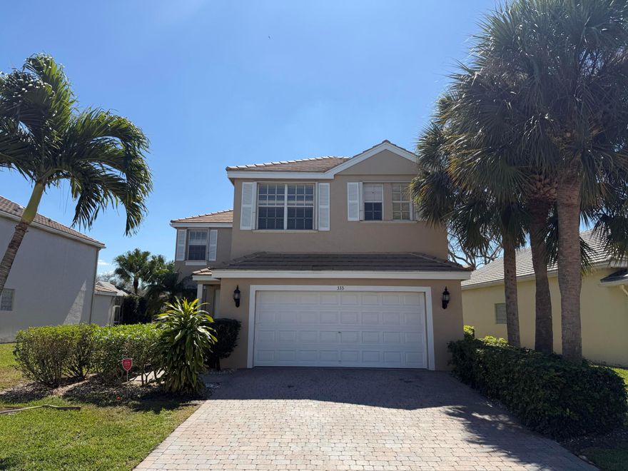 The house is also an option to Buy! Welcome to this freshly painted and impeccably maintained 4-bedroom, 2.5-bath ''Elizabeth'' model townhome in the prestigious, 24-hour manned guard-gated community of Victoria Grove. The home features modern upgrades including a newer AC, fridge, gas range, gas hot water heater, gas dryer, Nest Thermostat, and accordion shutters throughout. The spacious primary suite overlooks the lake and boasts his & her sinks and a relaxing Whirlpool Jacuzzi tub, complemented by a large flex room perfect for a nursery or home office. Resort-style community amenities include a clubhouse, fitness center, basketball and soccer fields, two tennis courts, pool with heated spa, and playground.
The home is perfectly situated on a peaceful double lake lot with serene water view from the covered patio and the primary suite. Located on 441 between Wellington and Royal Palm Beach, you are minutes from world-class equestrian venues, shopping, dining, and only 15 minutes from PBI, all within an A-Rated school zone with very fast HOA approval. This is a MUST SEE! Pets are welcome!