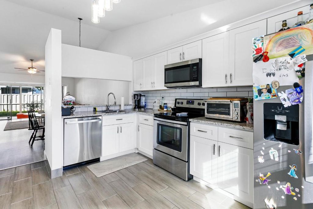 Photo of 140 Moccasin Trail S, Jupiter, FL 33458 (MLS # R11155815)