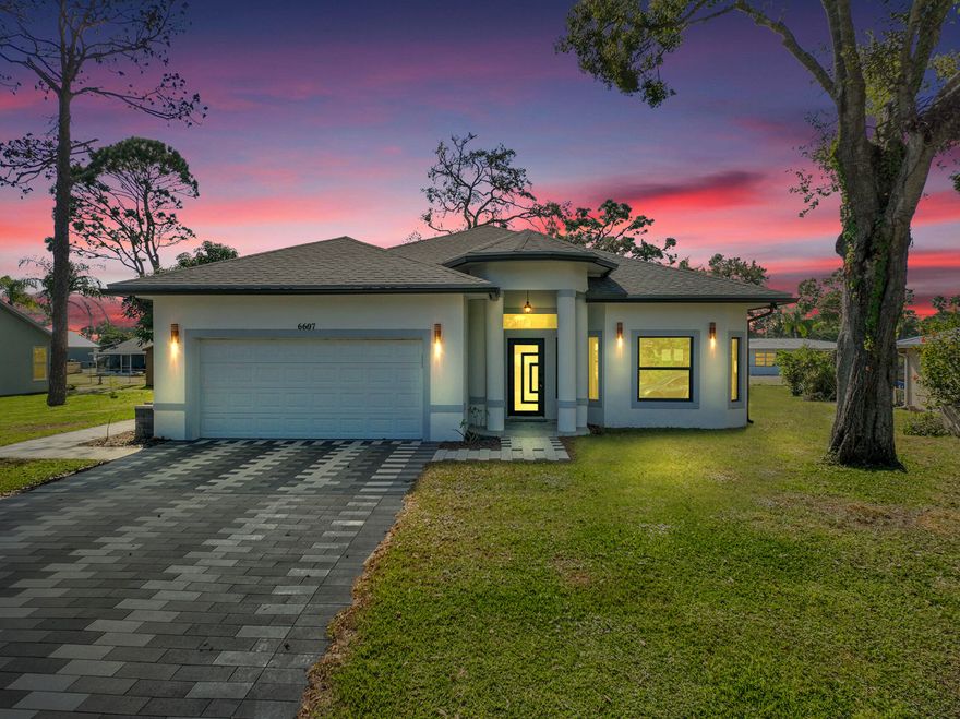 Beautiful NEW CONSTRUCTION 2024 CBS home with 3 bedrooms, 2 baths, and a 2-car garage. Built for peace of mind with impact windows/doors, this move-in ready home features a modern kitchen with upgraded cabinets, granite counters, and stainless appliances, plus porcelain tile floors throughout. Bathrooms include rain shower fixtures, while the garage is finished with an epoxy floor coating. Enjoy the outdoors on a spacious covered patio with 3 ceiling fans and a sprinkler system for easy lawn care. Conveniently located in Lakewood Park, just minutes from I-95, the Turnpike, beaches, shopping, dining, and downtown Fort Pierce, Vero Beach, and Port St. Lucie. Move in ready!