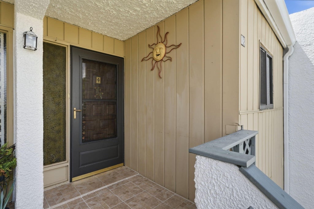 Photo of 1501 NE 13th Terrace #H12, Jensen Beach, FL 34957 (MLS # B26062307)
