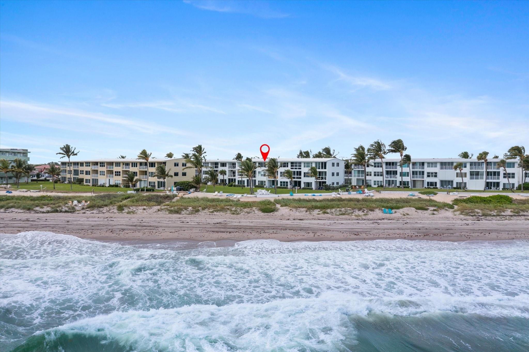 Come Live by the Sea — where sunrises over the ocean awaken you, and the soft sound of waves lull you to sleep. This fabulous corner unit showcases breathtaking ocean views throughout via impact windows and doors. The light and airy interior features a crisp white island kitchen with granite counters and stainless-steel appliances. Enjoy your morning coffee or evening glass of wine on the spacious balcony directly overlooking the beach, ocean, and manicured landscape. Nestled between the ocean and Intracoastal, residents enjoy a serene quintessential coastal lifestyle while remaining close to everything South Florida has to offer.