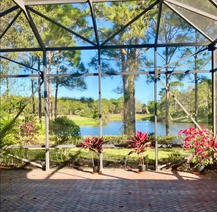 SPECTACULAR GOLF & WATER VIEWS! Nestled within the prestigious PGA Village in the Briarcliff subdivision, this exquisite 3-bedroom plus den, 3.5-bathroom home offers an unparalleled living experience. Designed with the discerning homeowner in mind, this residence boasts an open-concept great room floor plan that seamlessly connects the kitchen, dining, and living areas, creating a spacious and inviting atmosphere. High ceilings and large windows flood the space with natural light, highlighting the elegant finishes and thoughtful design. The kitchen is equipped with stainless steel appliances, a walk-in pantry for ample of extra storage, granite countertops, 42'' cabinets, and a convenient snack bar perfect for culinary enthusiasts and entertaining guests.